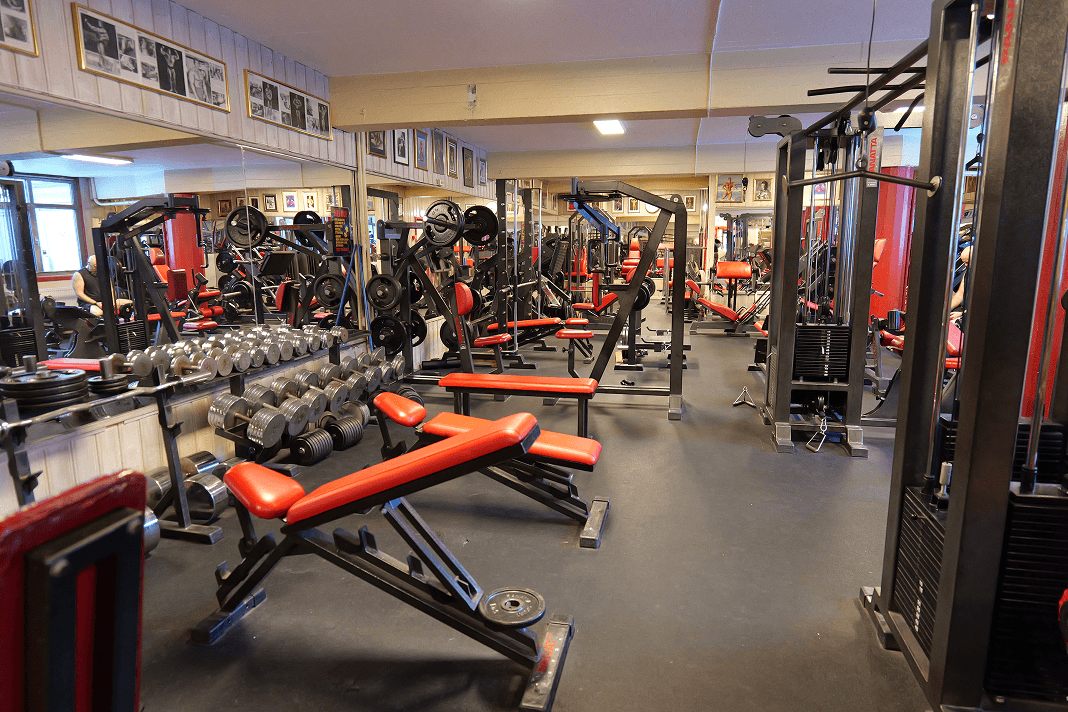 Interior of Haralds Gym Oslo with old-school equipment across two floors