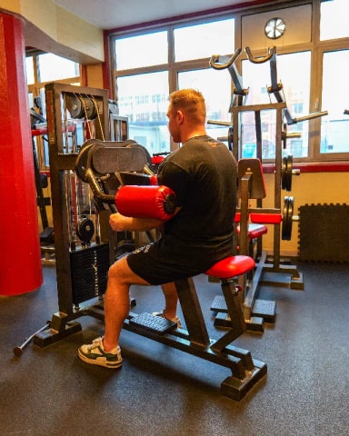 Machine Lateral Raise exercise demonstration